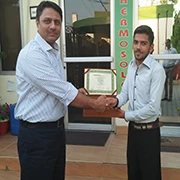 Mr. AGHA AHMAD RAZA (GMO) handing over Internship Certificate to Mr. Ali Akram